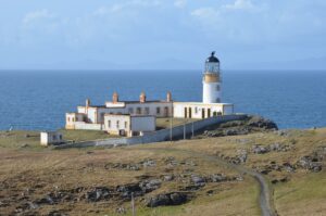 lighthouse at edge of cliff