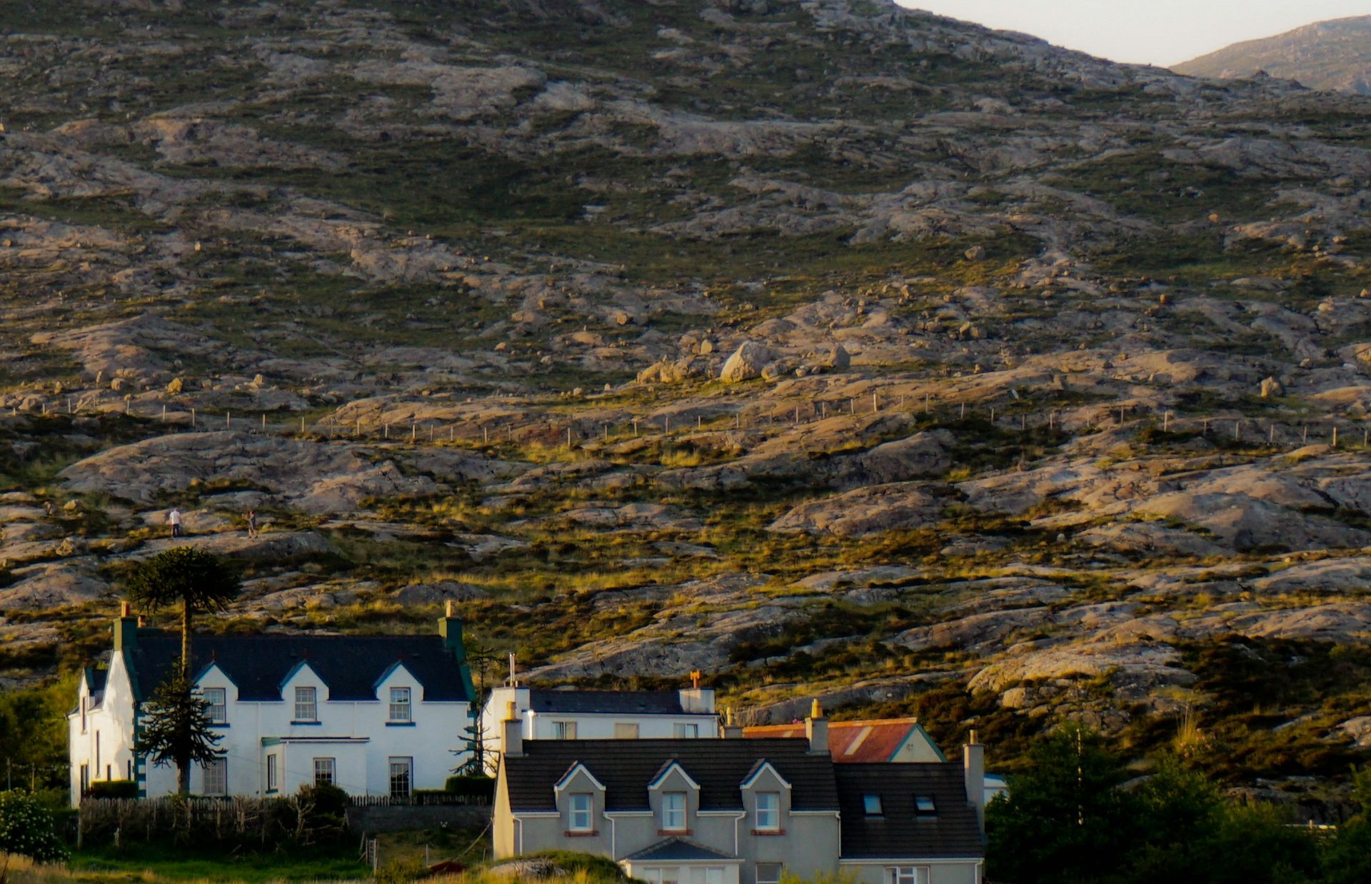 Harris hills with houses set against beautiful green mountains