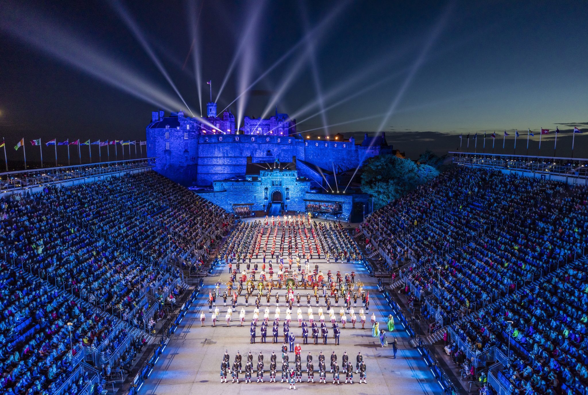 Military tattoo showcase on Edinburgh Castle Esplanade with beautiful lighs