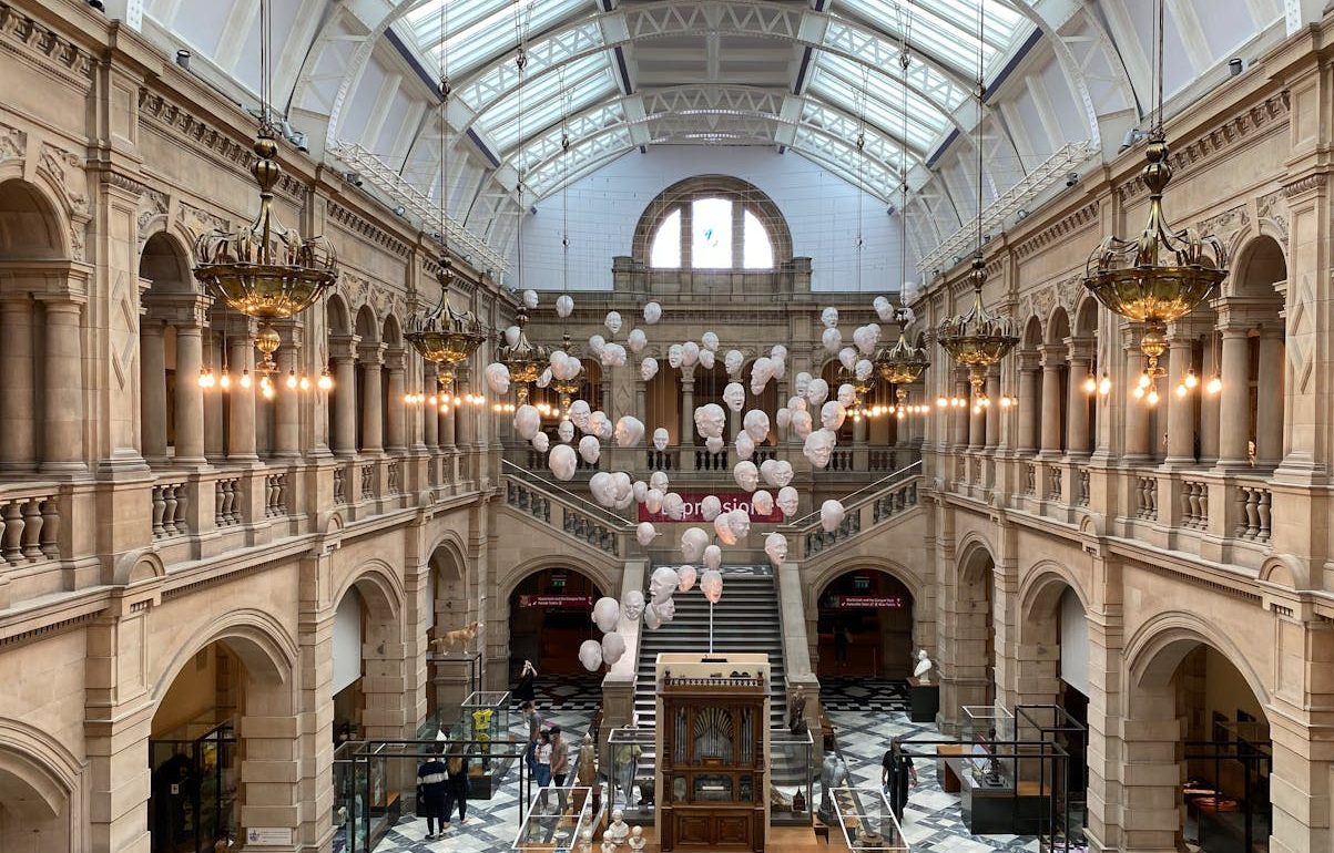 Beautiful interior of art gallery with arches and a glass ceiling