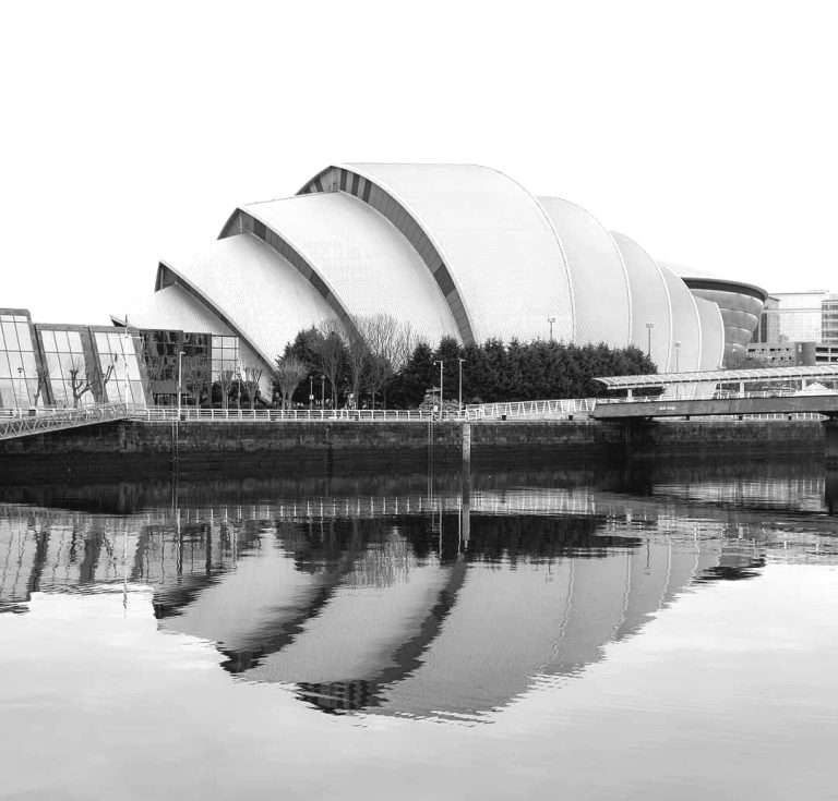 SEC - an armadillo shaped venue made of concrete often referred to as resembling the sydney opera house
